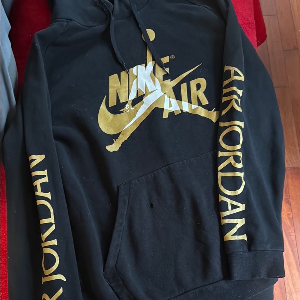 Nike Black and Gold Sweater with Metallic Accents